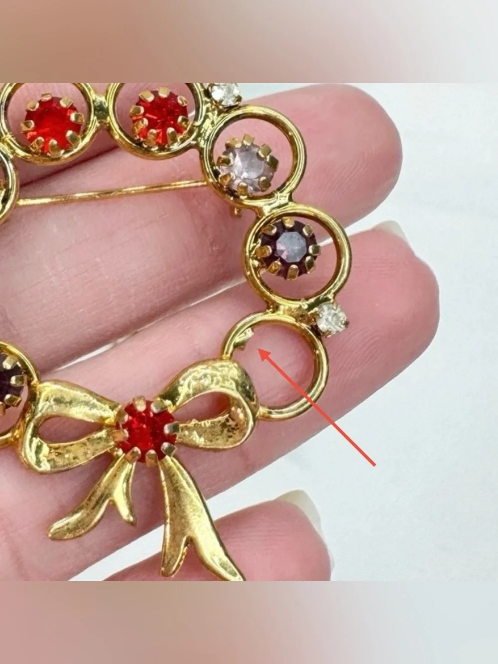 Vintage 60s Multicolor Rhinestone Open Circle Ring Ribbon Bow Gold Tone Brooch